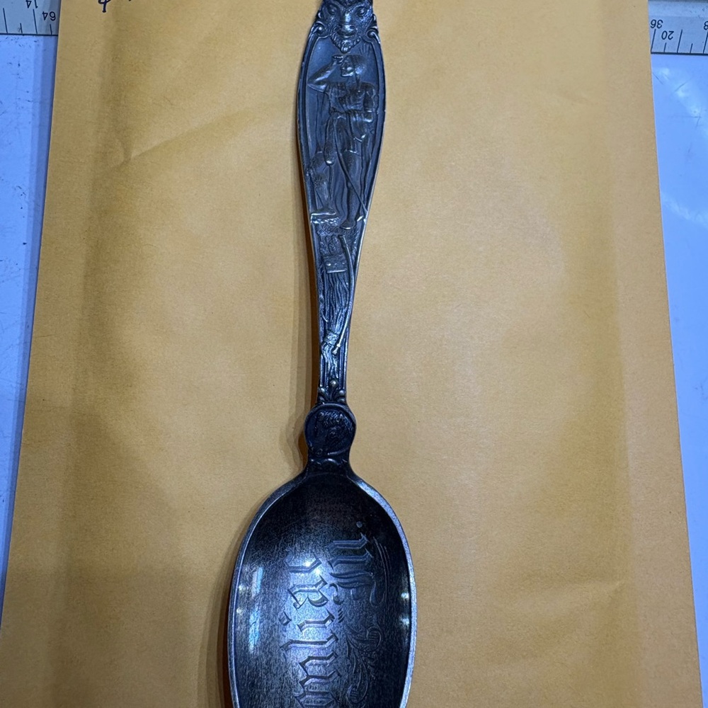 Intricately Designed Silver Spoon
